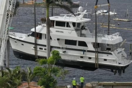 Crane lifting boat